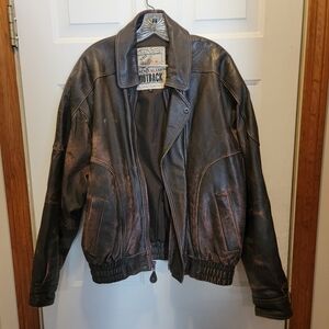 100% leather jacket, bomber style, New Zealand Ourback, size large.